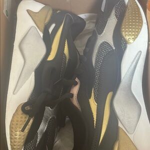 Stylish Black and Gold Sneakers